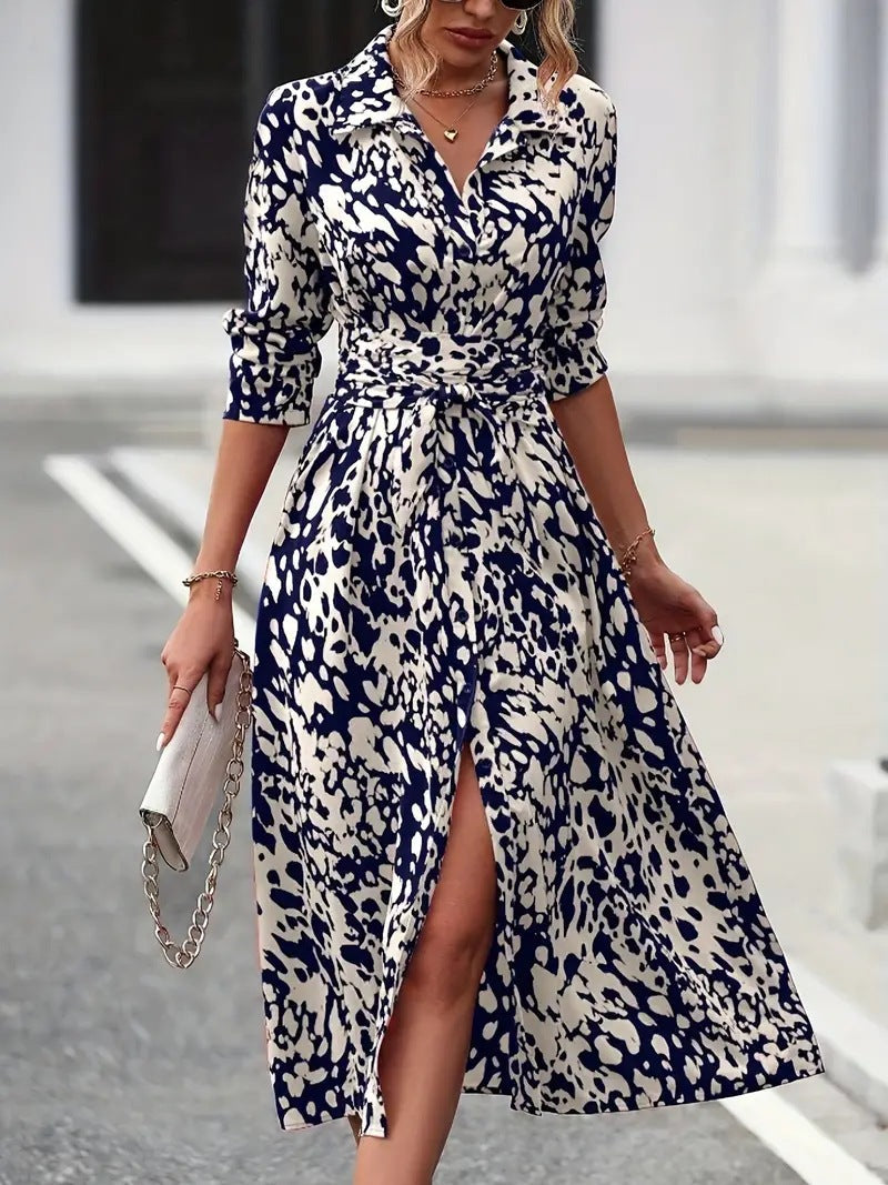 Female in a button-down midi dress with a clean silhouette and relaxed fit.