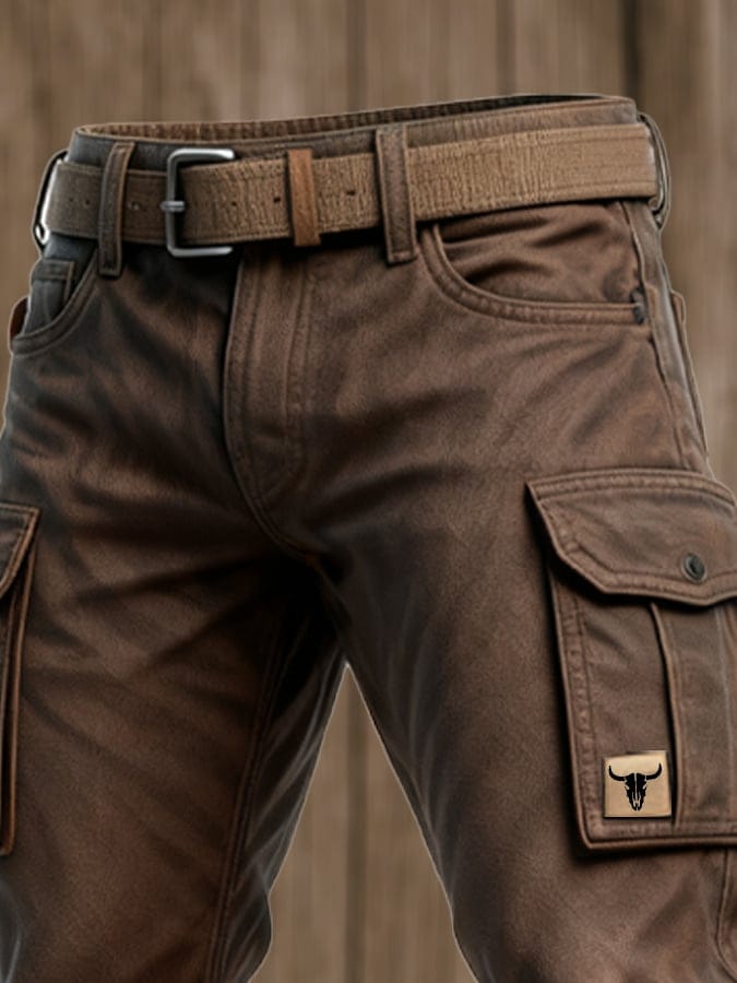 Cargo pants with buttoned side pockets against a plain background.