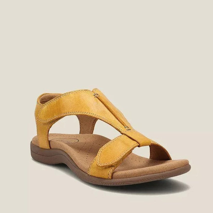 Comfortable women’s walking sandals displayed on a plain background with supportive soles and refined style.