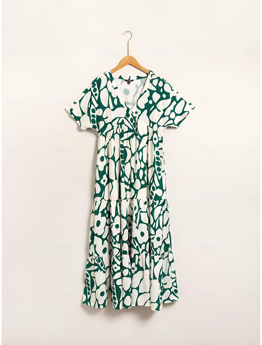 Flattering warm-weather dress displayed on a clean background.