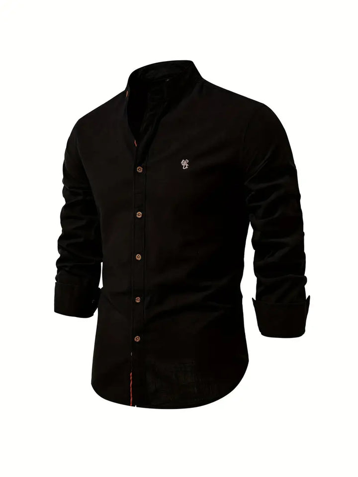 A clean everyday shirt with long sleeves on a plain background.