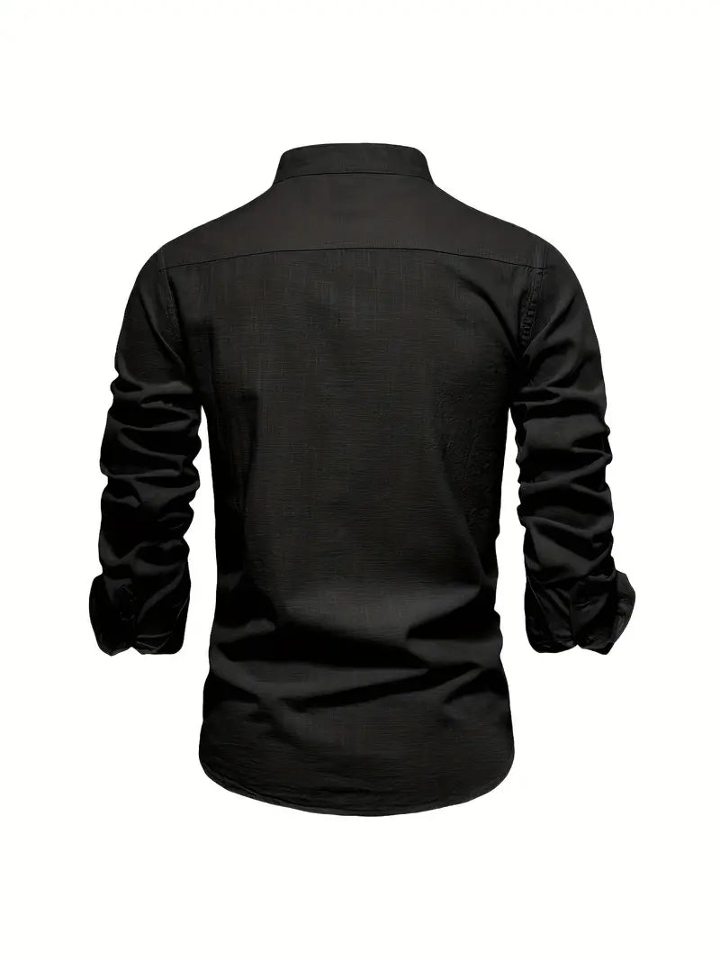 Abutton-front shirt with a smooth slim shape on a plain background.