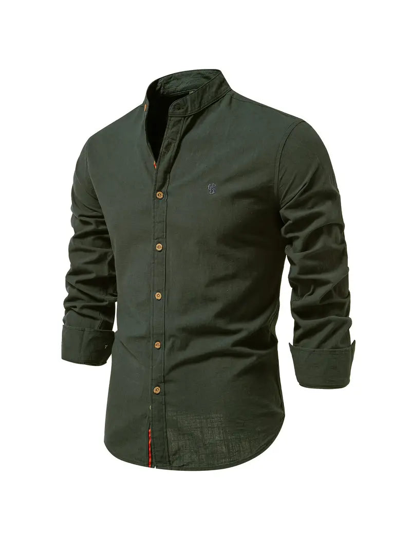 A collared long sleeve shirt with button cuff details on a plain background.
