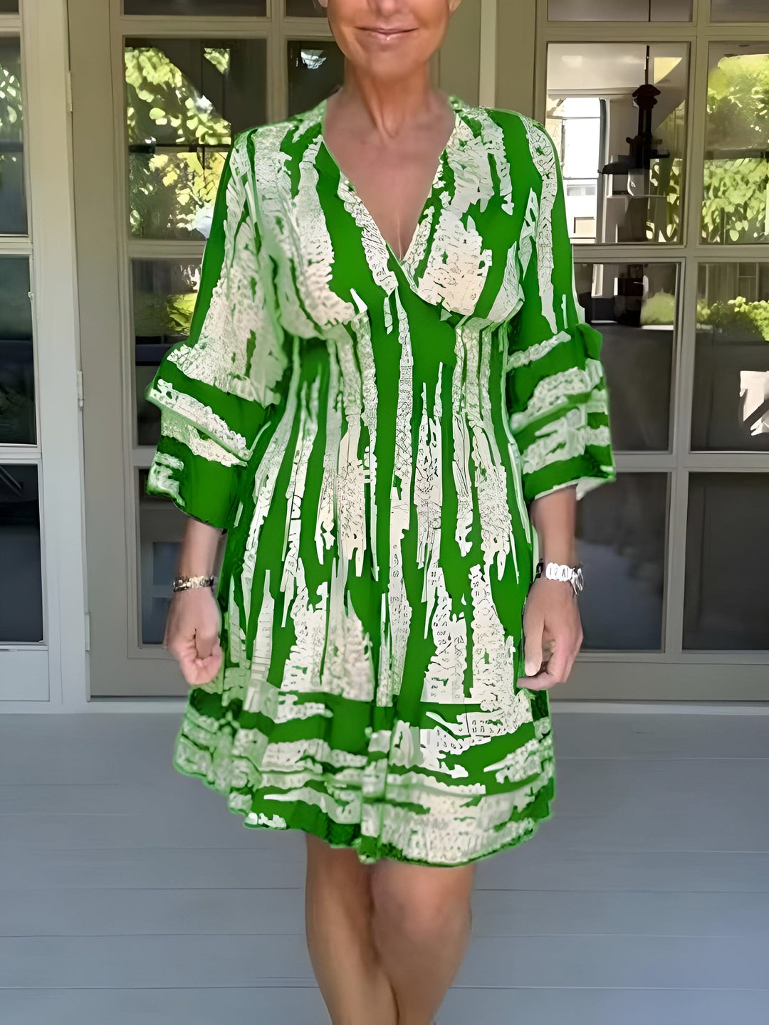 Elegant lightweight dress with a softly flared hem.