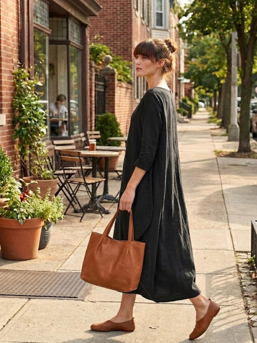 Casual everyday maxi dress with easy movement shown on a plain backdrop.