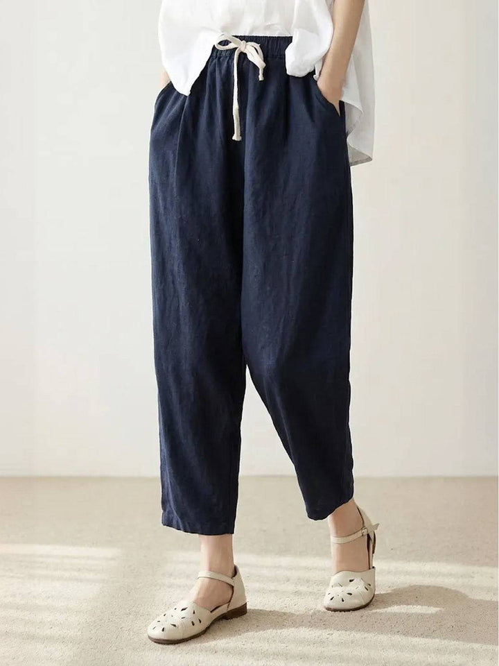 Women’s simple casual pants shown on a plain background with elasticated waist.