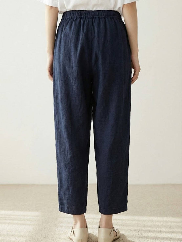 Women’s drawstring waist pants on a plain background for travel and daily outfits.