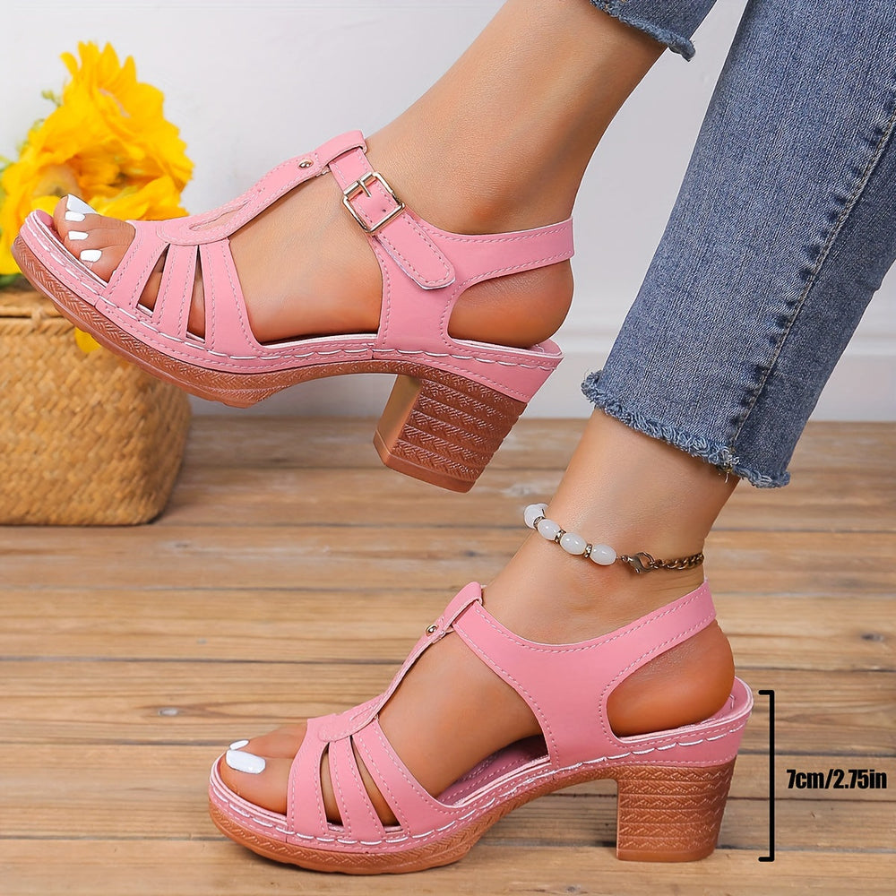 Feet wearing adjustable strap sandals with cushioned sole on a clean background.