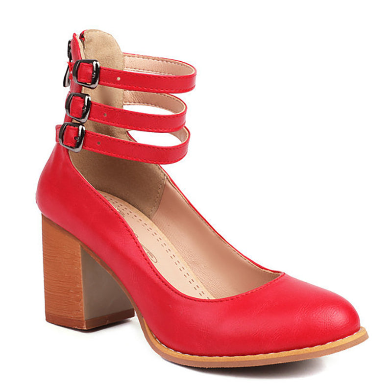 Minimal block heel sandal shown on foot against a clean background.