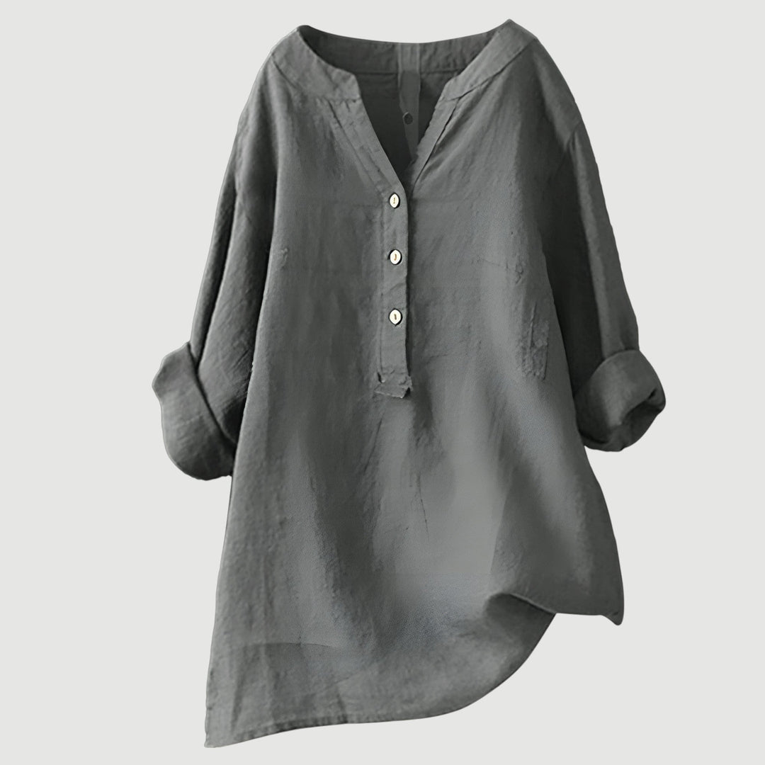 Elegant flowing tunic top for everyday wear on a clean background.