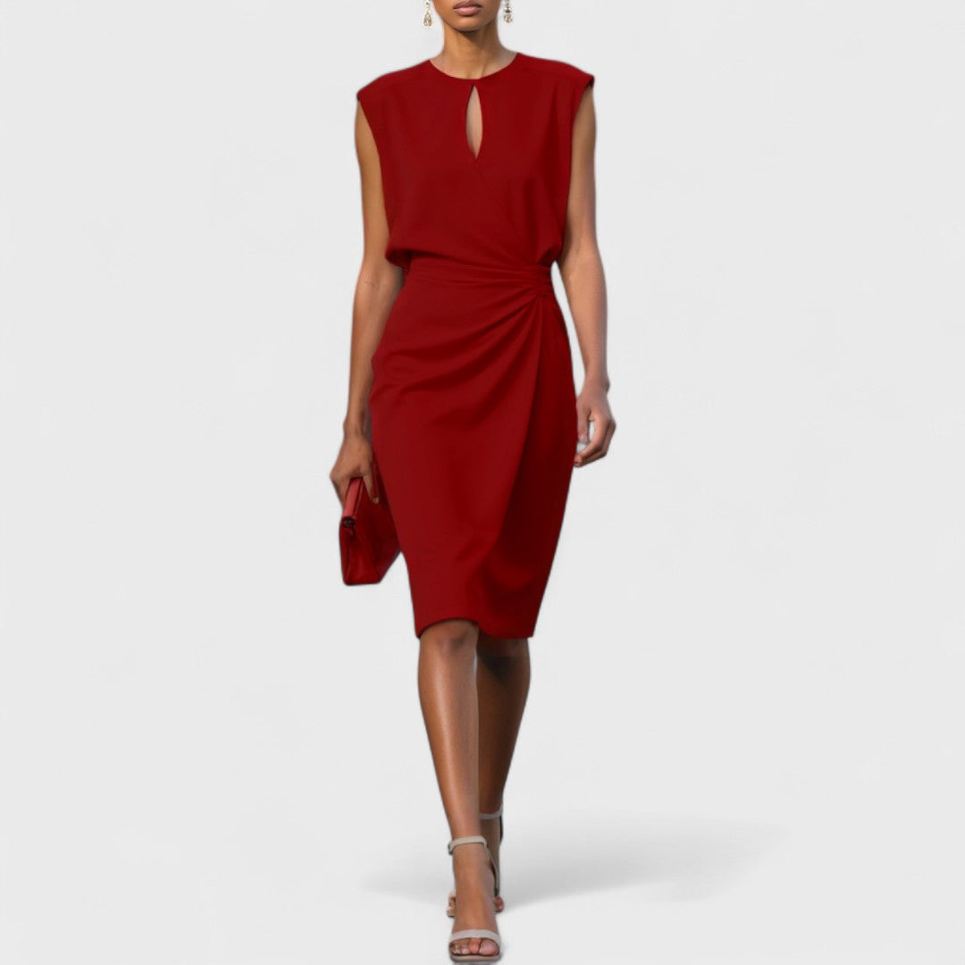 Sophisticated dress for women with model on a clean background.