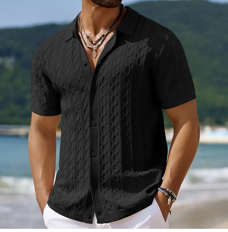  Male model displaying a structured-texture polo shirt with front buttons against a plain background.