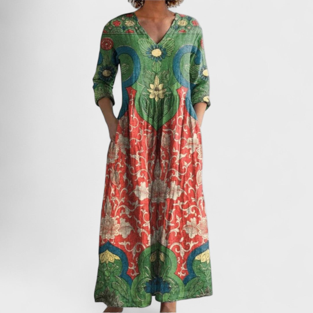 A flowing maxi dress with vintage floral print and elegant silhouette.