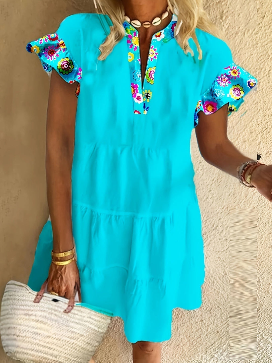 Boho-inspired women’s dress with artistic patterns and relaxed fit.