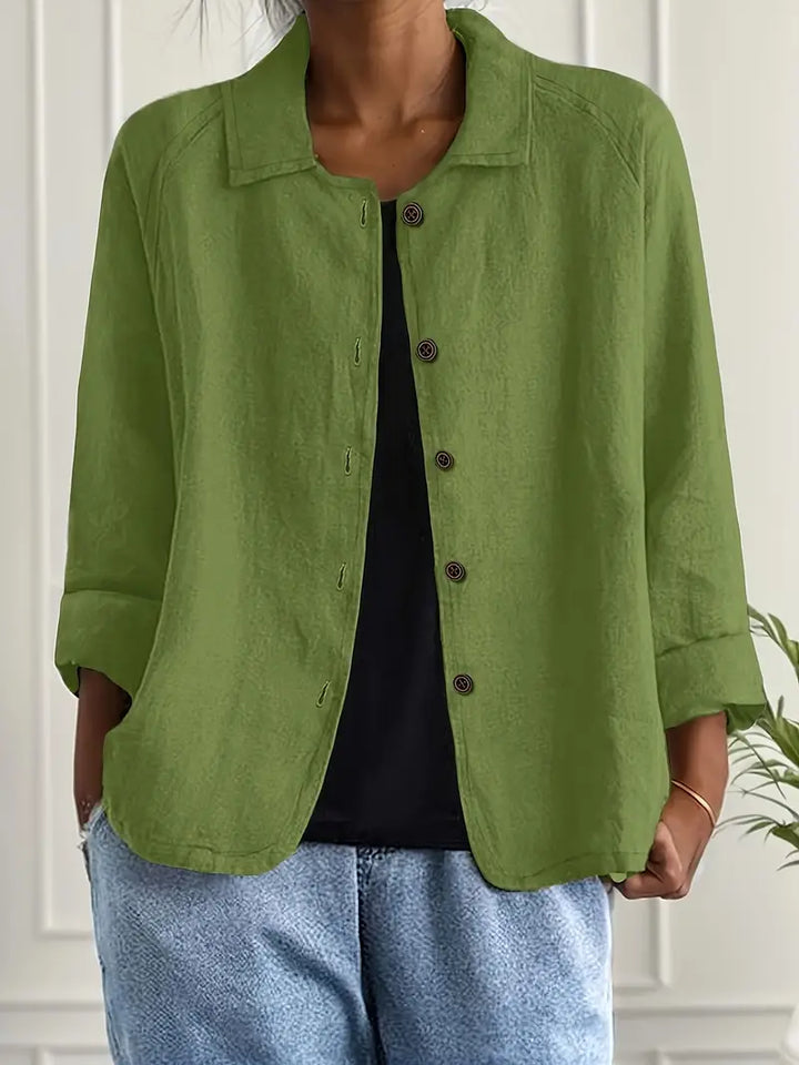 Elegant everyday top displayed on a plain background with breathable comfort and style.