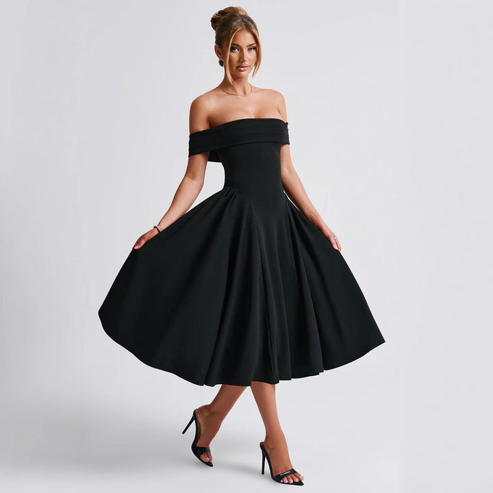 Woman wearing an elegant off-shoulder A-line midi dress on a plain background.