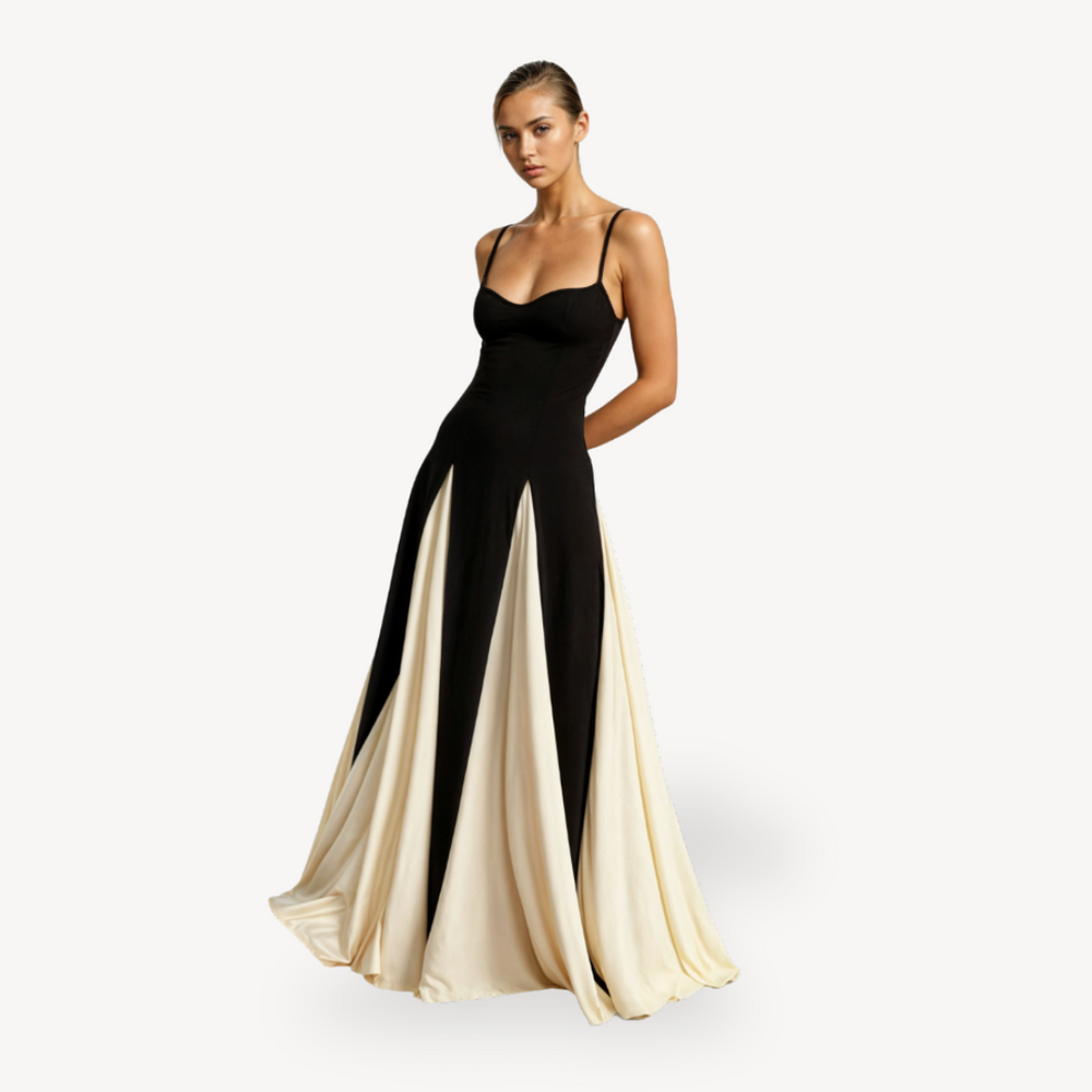 Model in elegant satin maxi dress with spaghetti straps on a clean background.