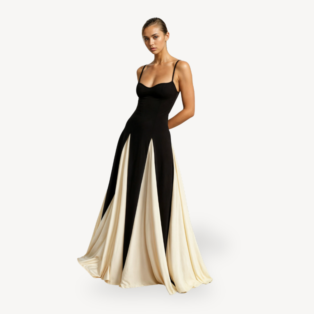 Model in elegant satin maxi dress with spaghetti straps on a clean background.