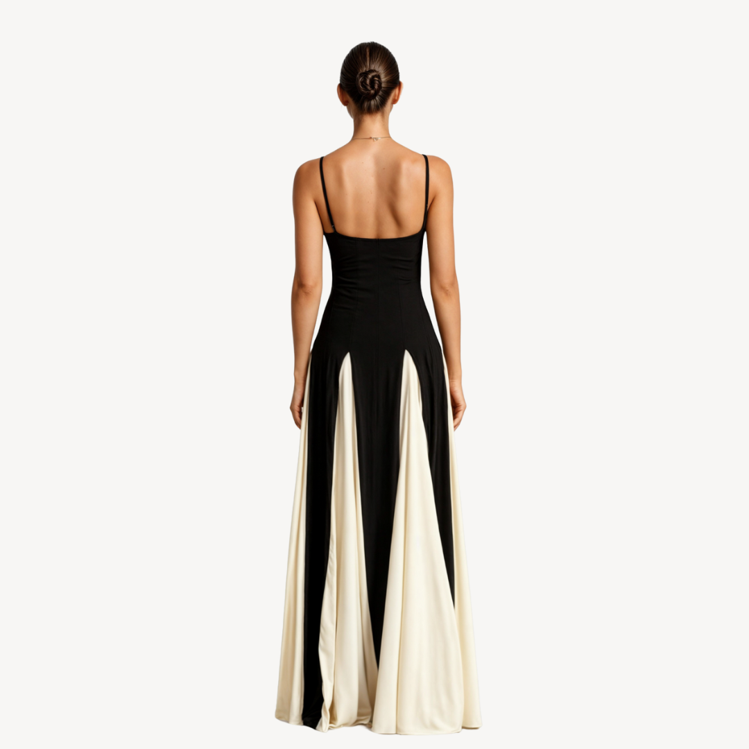 Woman in flowing satin maxi dress with fitted bodice on a clean background, back angle view