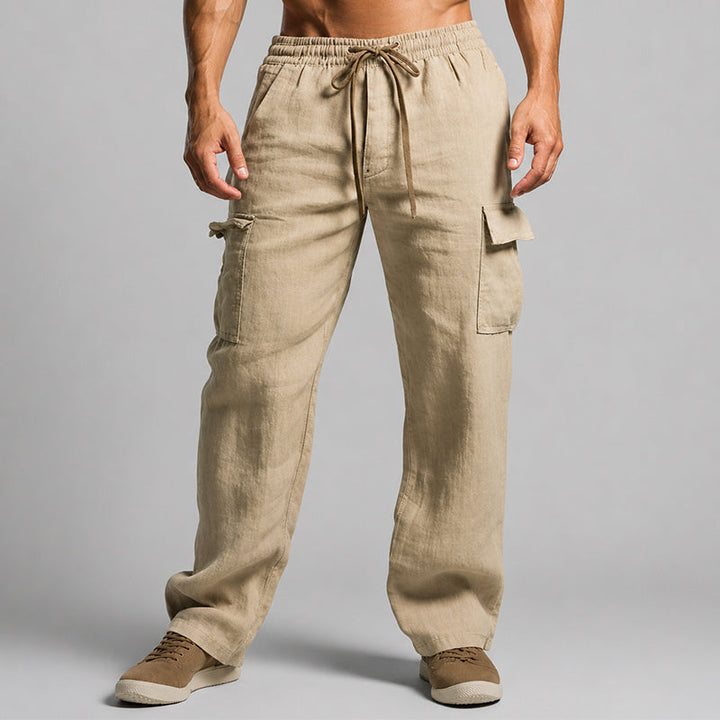 Woman wearing relaxed cargo pants on a plain background.
