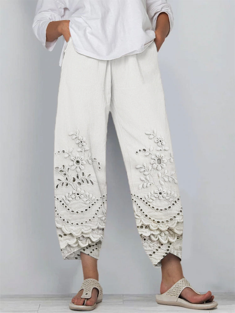 Female model wearing stylish trousers with a refined everyday look.