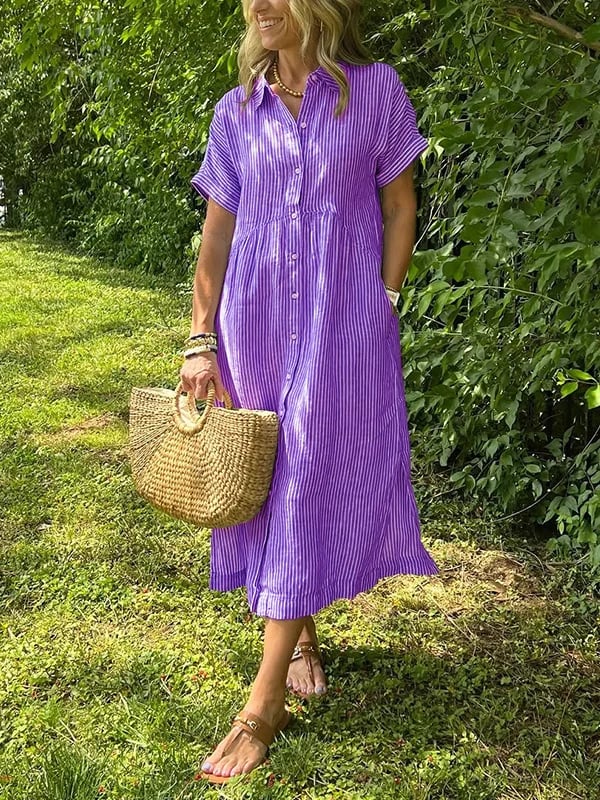 Lightweight striped long shirt shown w/ model against a nature background.
