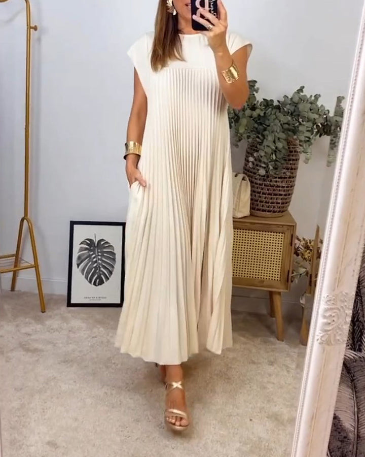 Elegant long dress with lightweight fabric shown on a female model.