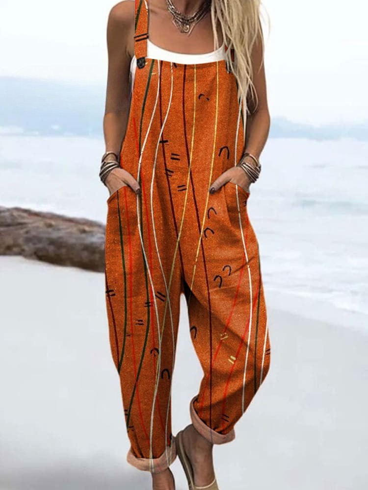 Female model wearing an artistic line print jumpsuit against a plain background.