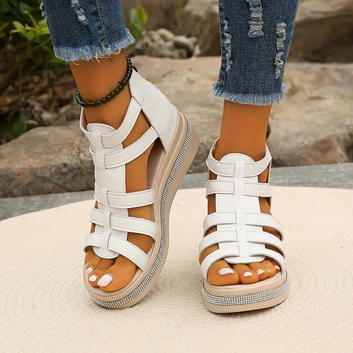 Female wearing stable heel comfort sandals for casual summer outfits.