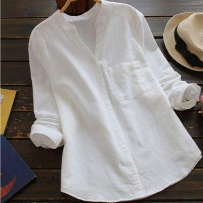 Front view of loose shirt on plain background.