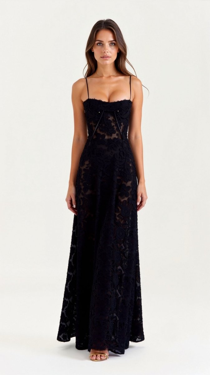  Woman showcasing a flowing floral evening dress with a graceful silhouette on a plain background.