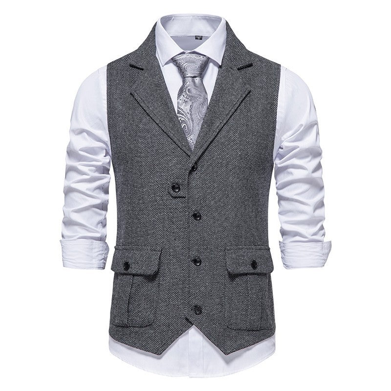 Model in smart tailored vest, front angle, gray background.