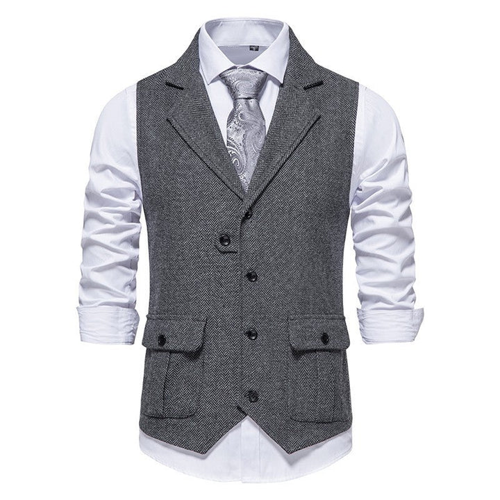 Model in smart tailored vest, front angle, gray background.