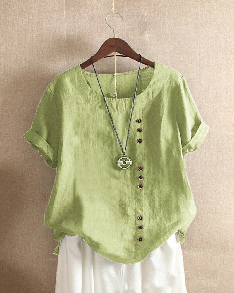 Airy natural fabric blouse shown straight front on background.