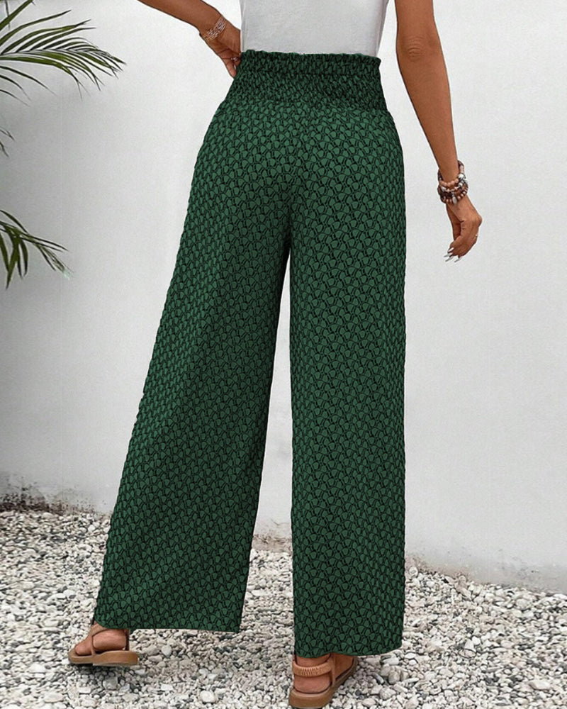 Wide-leg trousers with easy movement shown on a plain background.