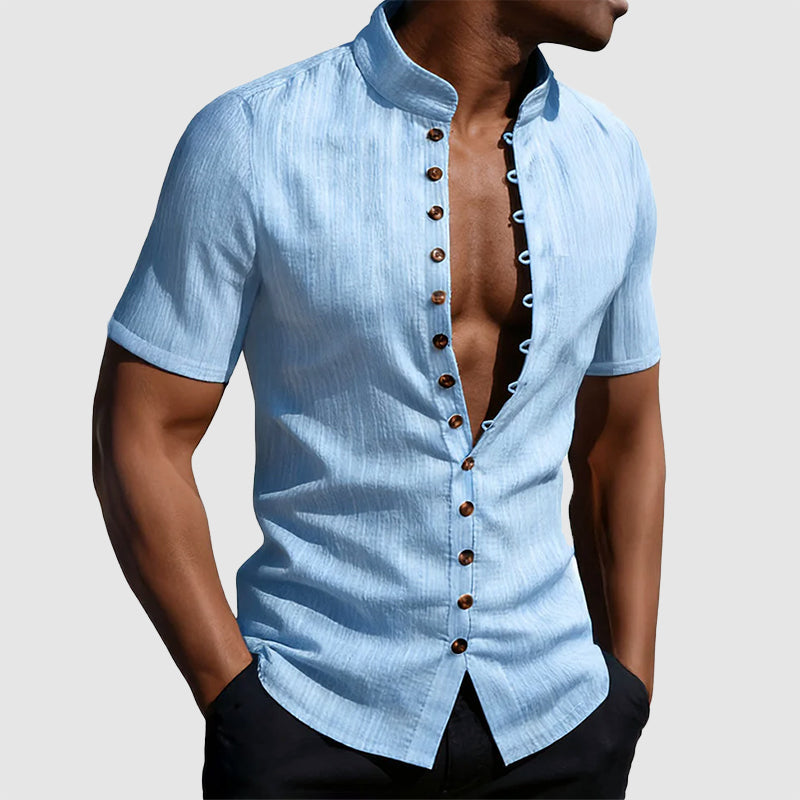 Male model in a modern mandarin collar shirt against a plain background.