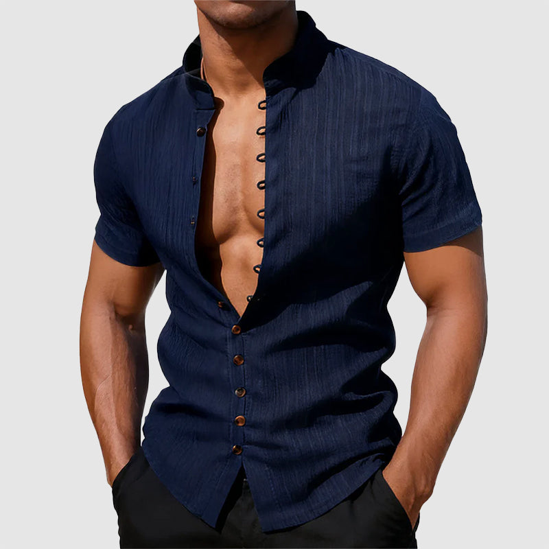  Model in a streamlined long sleeve shirt with a mandarin collar.