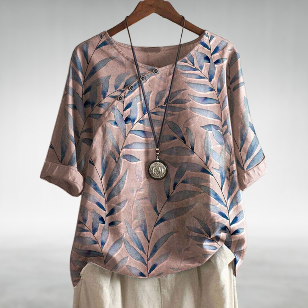 Elegant lightweight blouse on a clean background with a polished silhouette and feminine everyday charm.