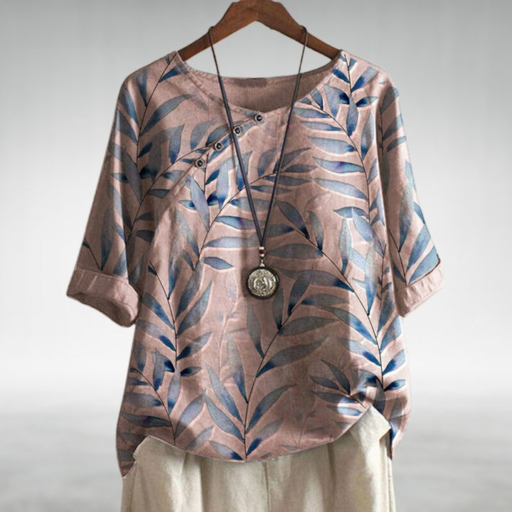 Elegant lightweight blouse on a clean background with a polished silhouette and feminine everyday charm.