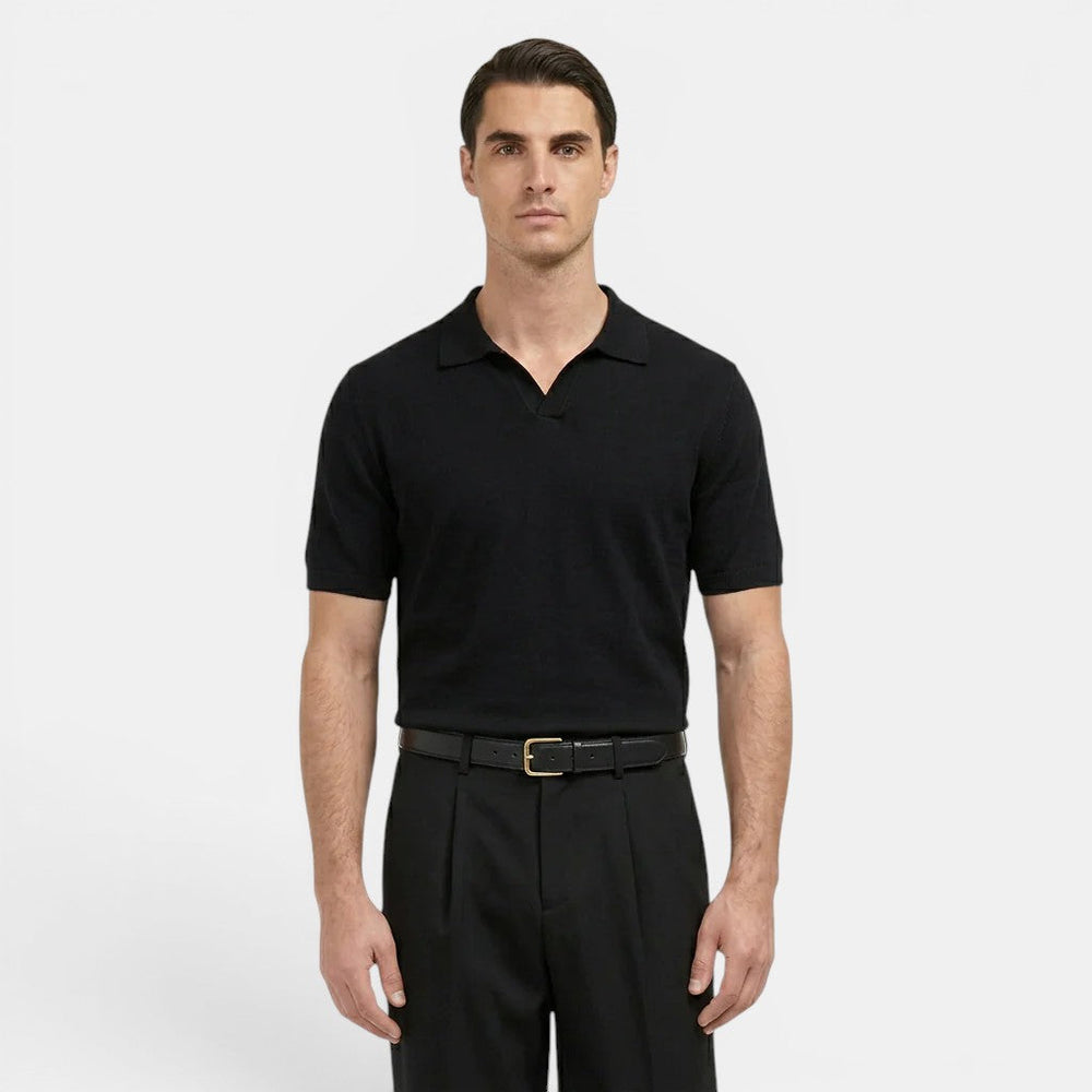  Male model showcasing tailored straight leg trousers with a clean silhouette on a plain background.