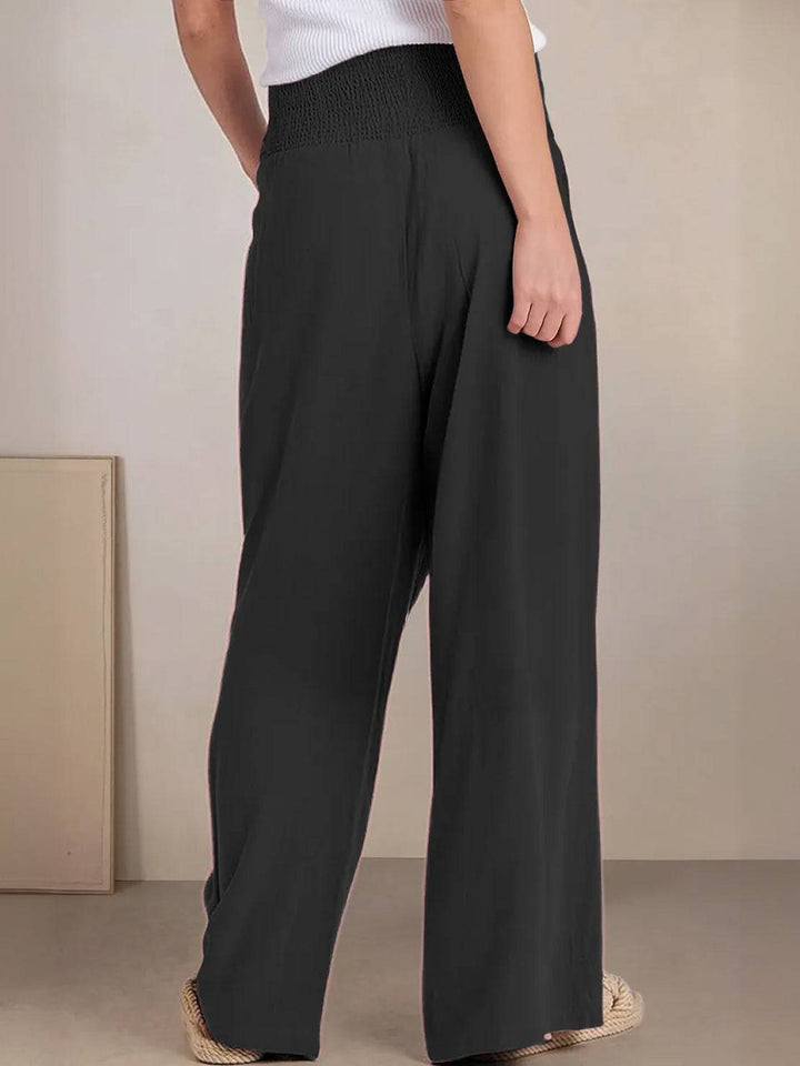 Casual wide leg bottoms with pleated front and easy pull-on waist.