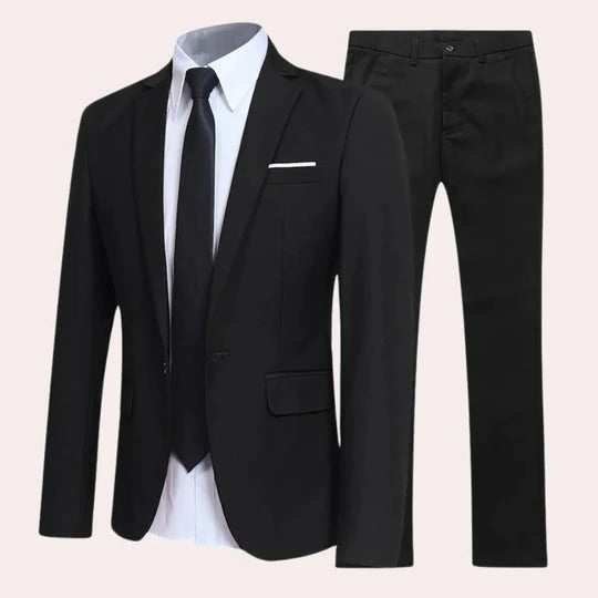 A classic two piece suit on a plain background.
