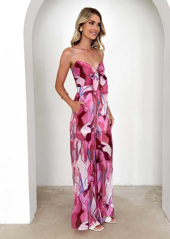 Women’s breathable printed dress with a long flowing cut for warm-weather outings.