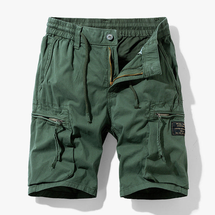 Cargo shorts for men with functional pockets on a plain background.