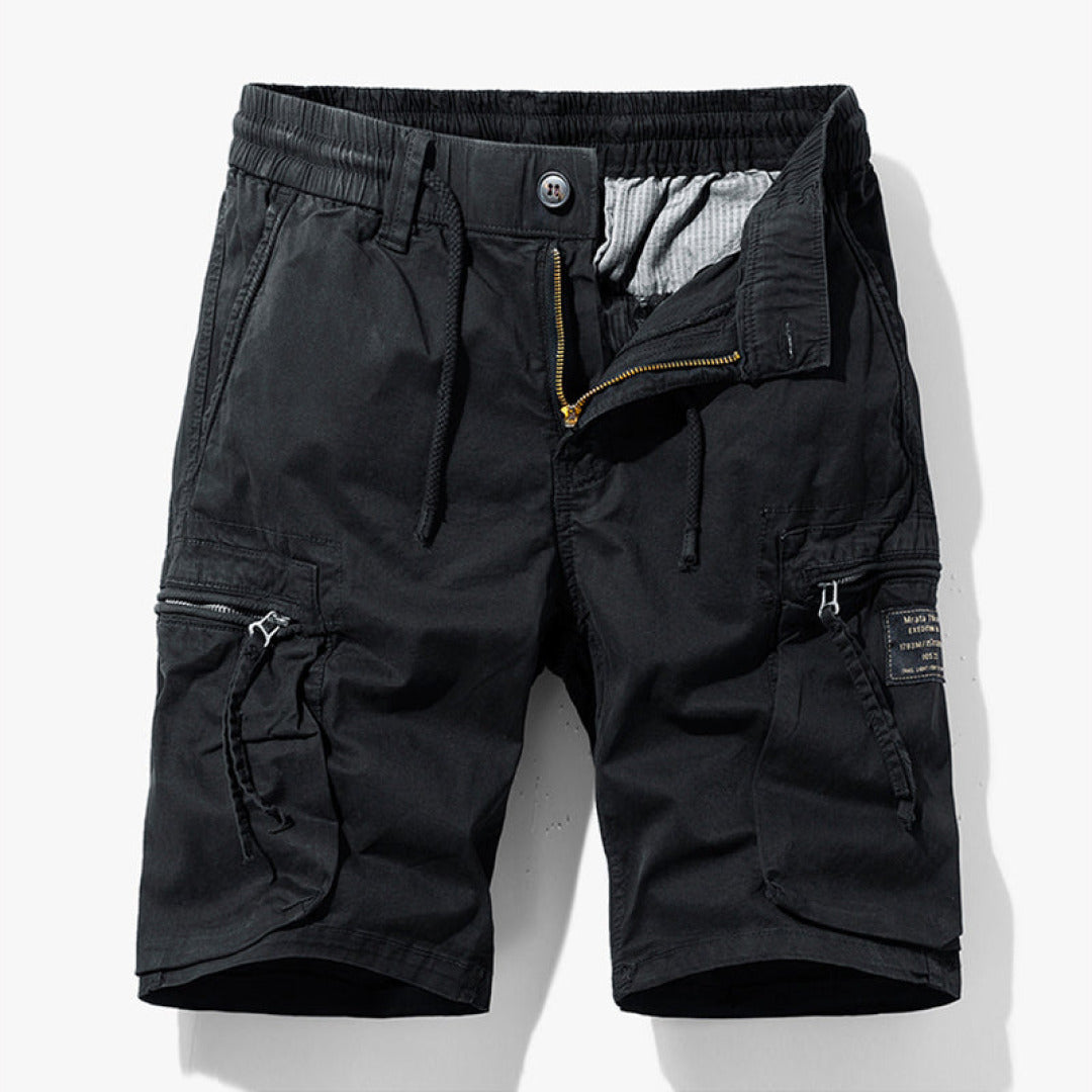 Men’s summer cargo shorts with clean casual styling on a plain background.