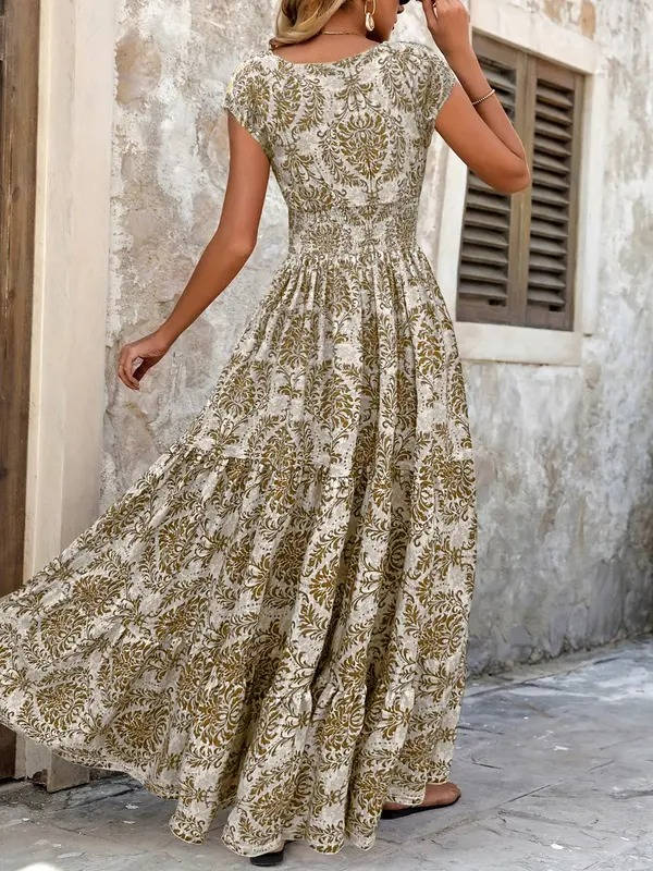 Female model showcasing a relaxed silhouette maxi dress on plain background