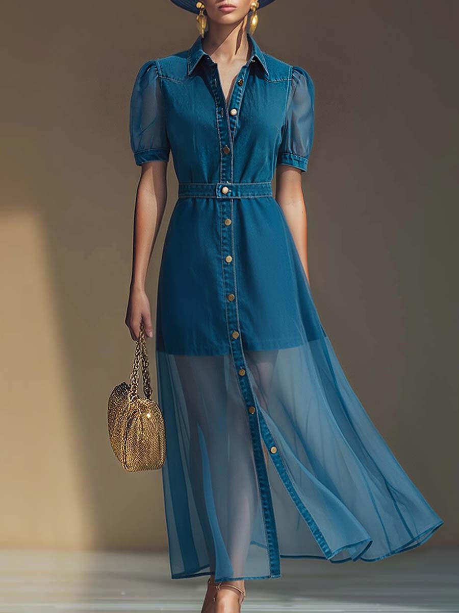 Female wearing a button-front denim maxi dress with short puff sleeves against a plain background.