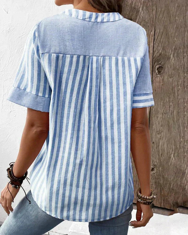 Flattering striped top styled with a wearer on a clean background.