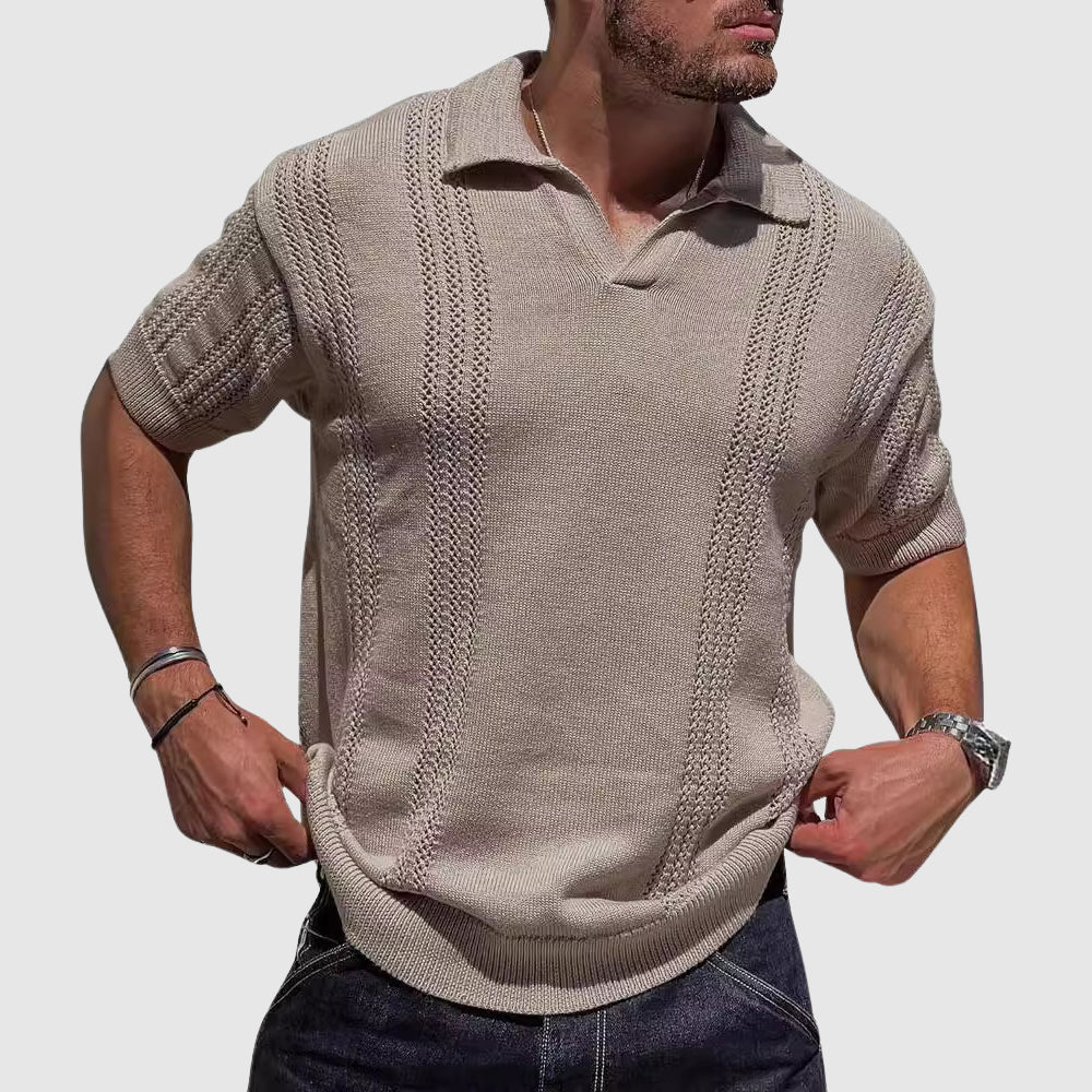  Male model wearing a casual open collar polo against a plain background