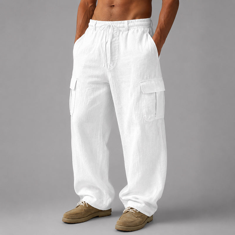  Male model wearing lightweight casual pants against a plain background.